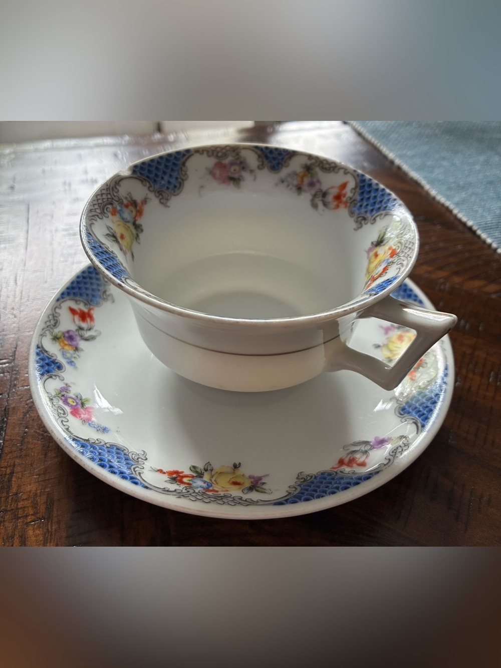 Gold Castle Porcelain Floral Blue Accent Teacup and Saucer